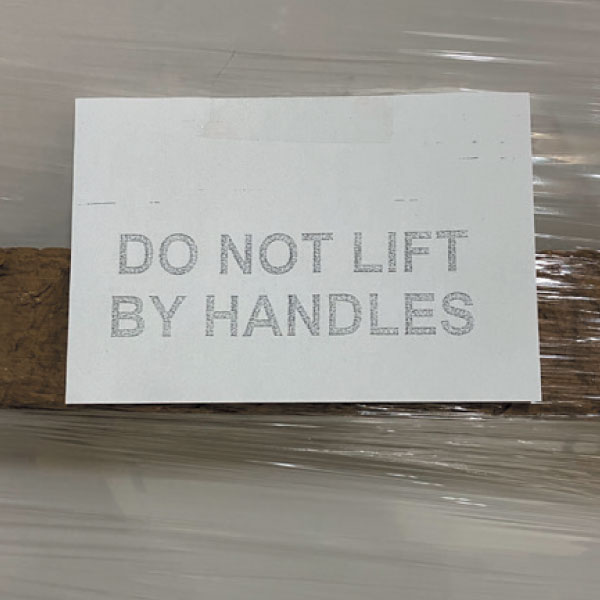 Do not lift by handles sign